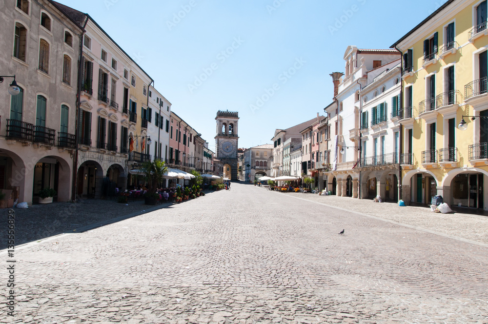 Obraz premium Walking along the street of the old village
