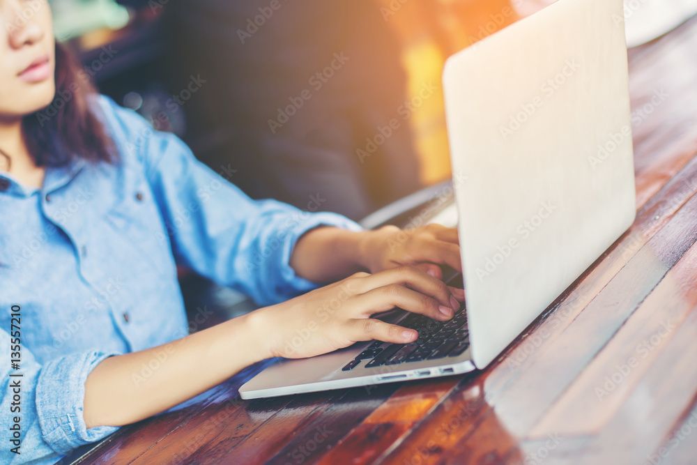 Naklejka premium hand control on a laptop touchpad