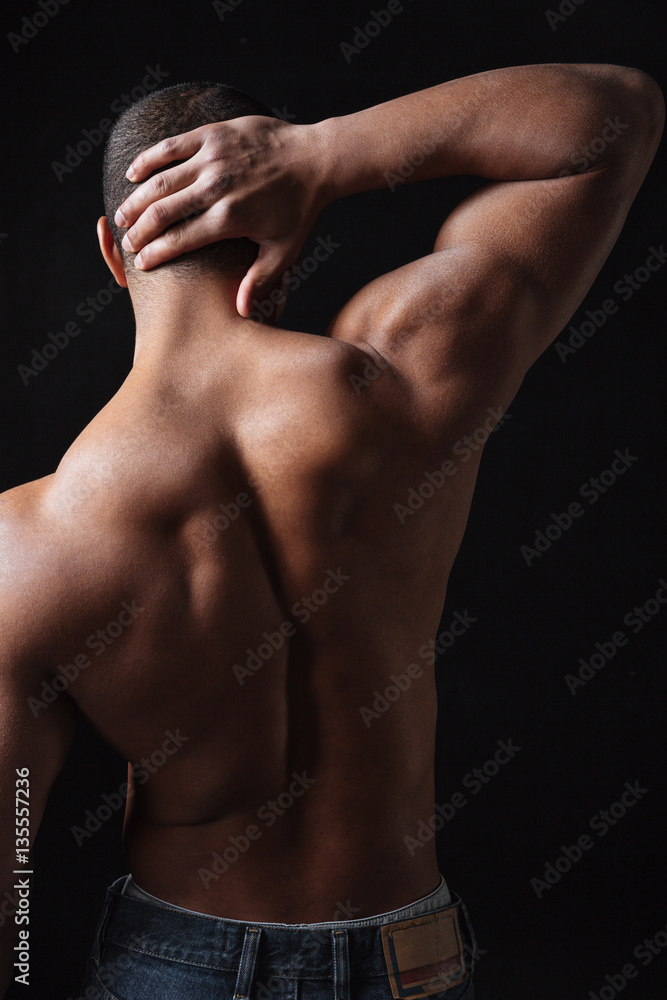 Back view photo of young african sportsman