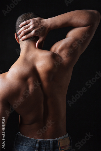 Back view photo of young african sportsman