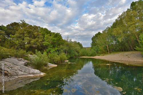 Small pond with a stone dam