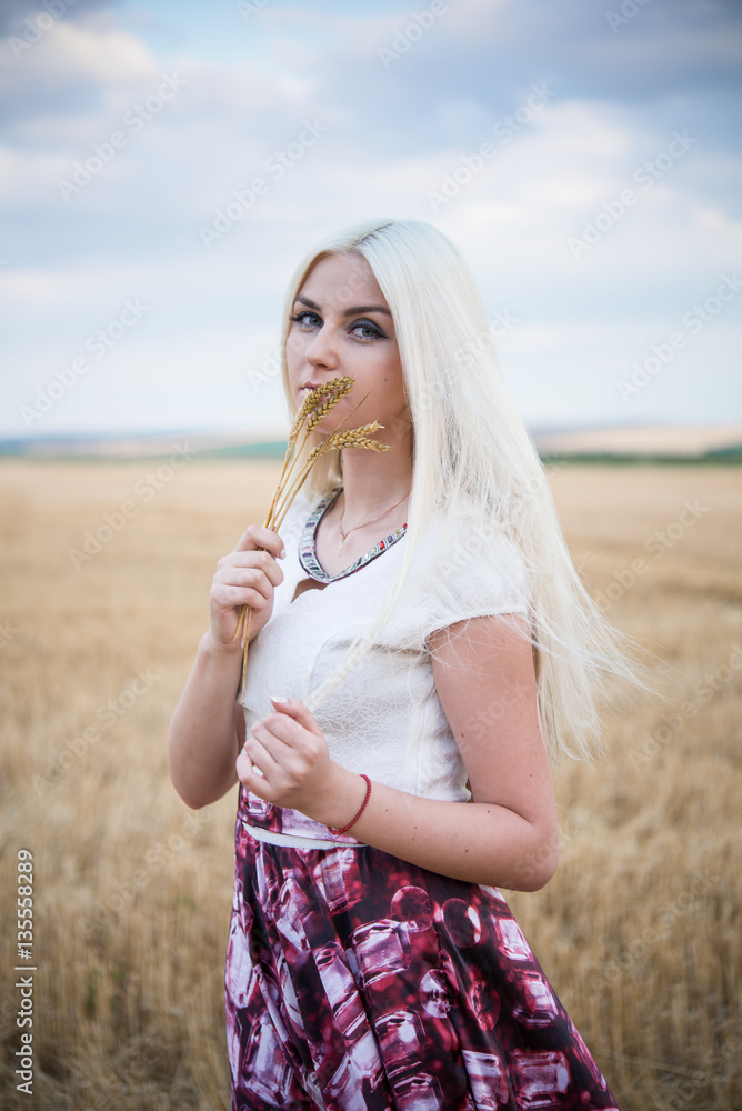 Blonde in a wheat field Blonde in a wheat field
