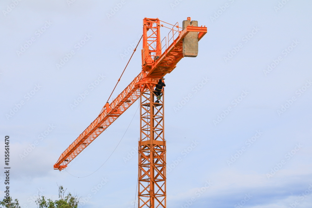 crane tower selective focus and construction in blue sky background crane tower selective focus and construction in blue sky background