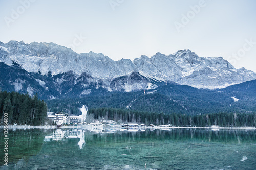 Winter landscape with lake and mountains, Zugspitze, Aibsee, Germany photo