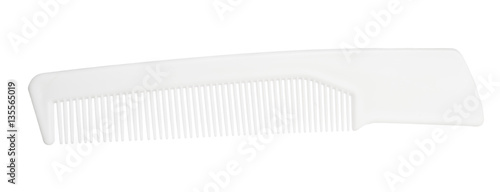 Foto Bright plastic comb isolated on white background