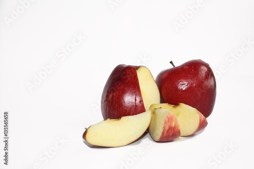 red ripe apples on white background isolated