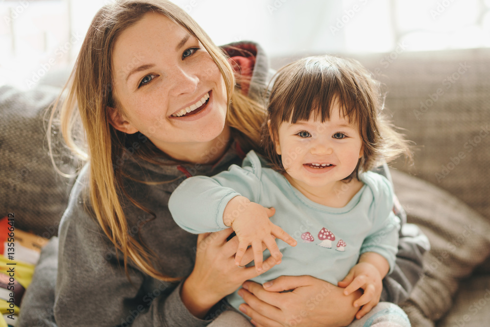 beautiful young mother with adorable little daughter beautiful young mother with adorable little daughter