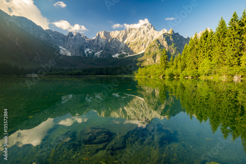 Fototapeta Naklejka Na Ścianę i Meble -  panorama of mountain lake in the morning in the Julian Alps in I