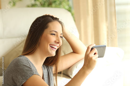 Girl watching streaming video in a smart phone