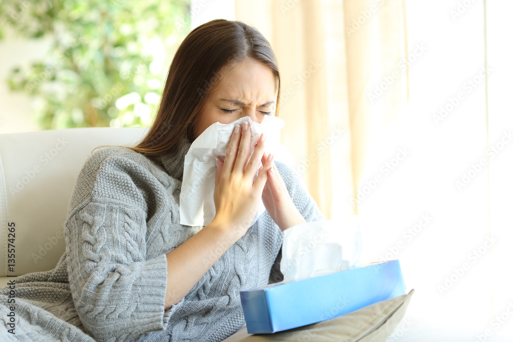 Woman blowing with flu in winter - obrazy, fototapety, plakaty 
