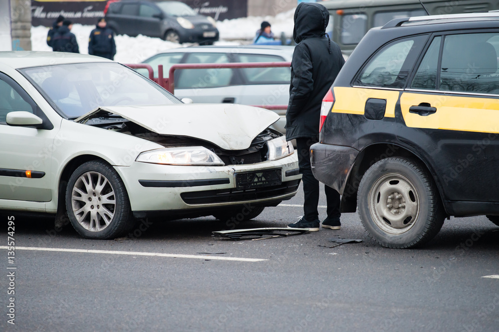 Accident on the winter road, smashed car Accident on the winter road, smashed car