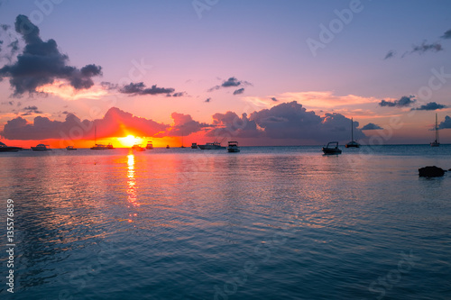 Fototapeta Naklejka Na Ścianę i Meble -  Beautiful sunset on a sandy beach in Mauritius