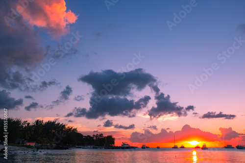 Beautiful sunset on a sandy beach in Mauritius