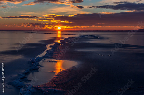 Winter sunset over the lake Balaton of Hungary © Arpad