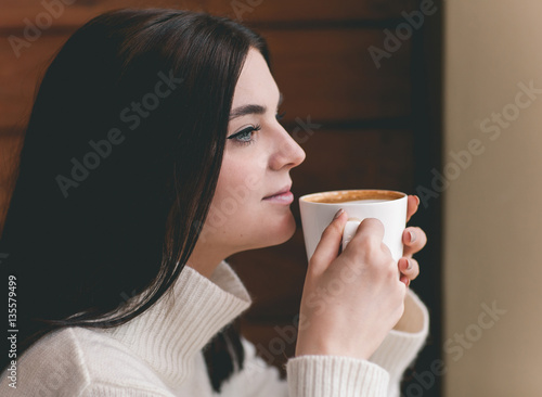 Beautiful Woman With Cup of Tea or Coffee