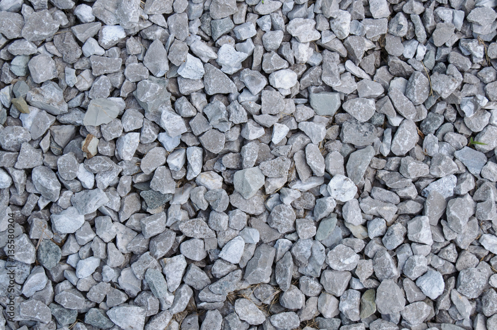 whitish and grayish gravel spread evenly whitish and grayish gravel spread evenly