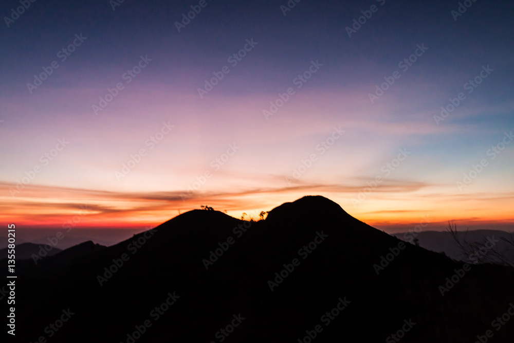 Sunset in the silhouette mountains , beautiful landscape