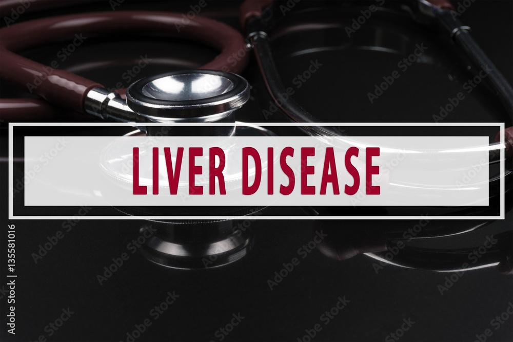 Obraz premium Stethoscope on black background with text LIVER DISEASE