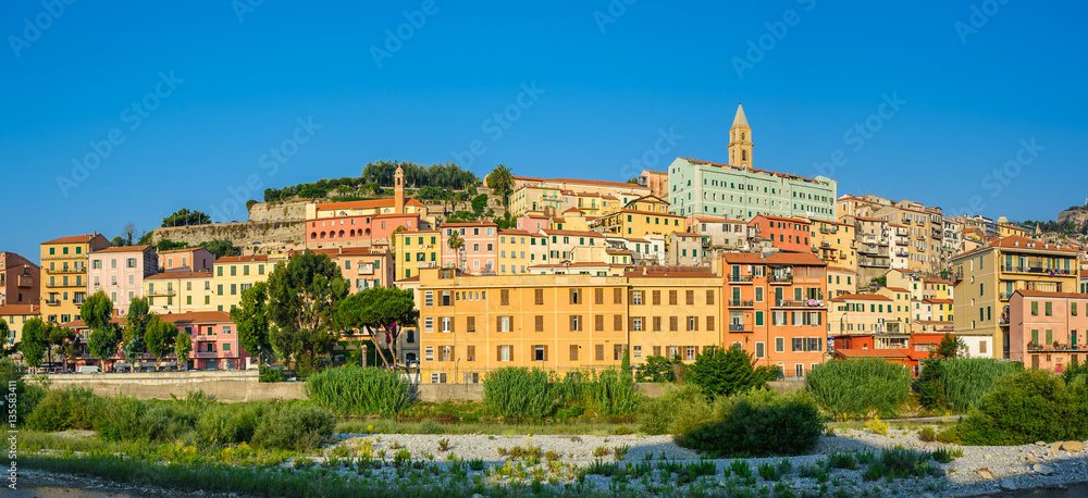 Obraz premium Colorful houses under blue sky in old town of Ventimiglia, Italy.