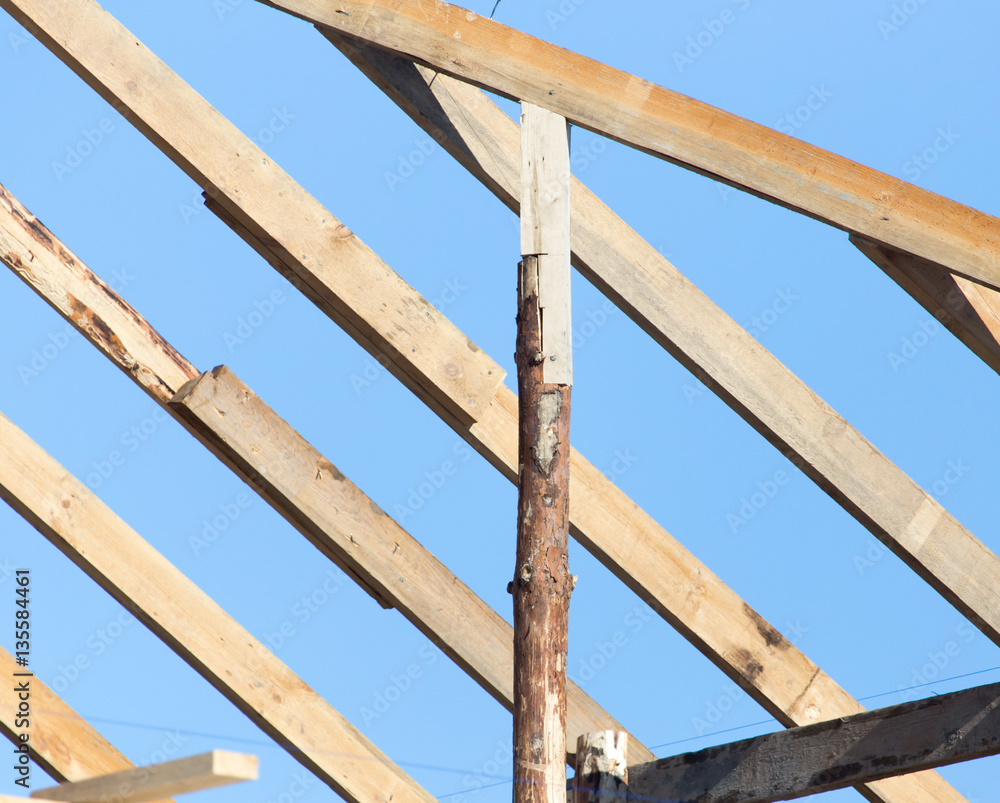 Wooden roof frame on a construction site Wooden roof frame on a construction site