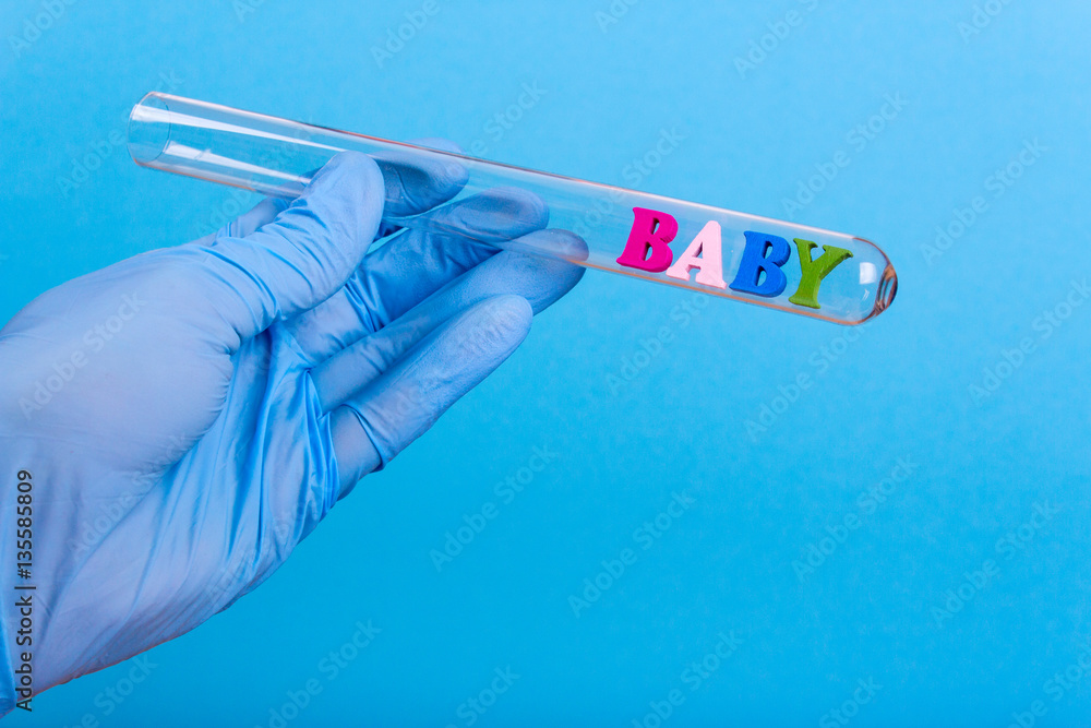 Εκτύπωση καμβά Word baby of colored wooden letters in test-tube