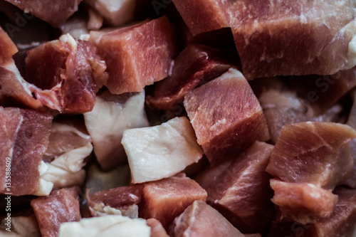 Fresh cubed meat background / wallpaper