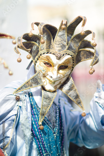 Man in Venice wearing a carnival mask