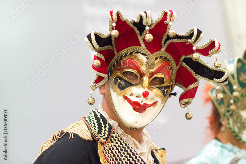 Fototapeta Naklejka Na Ścianę i Meble -  Man in Venice wearing a carnival mask