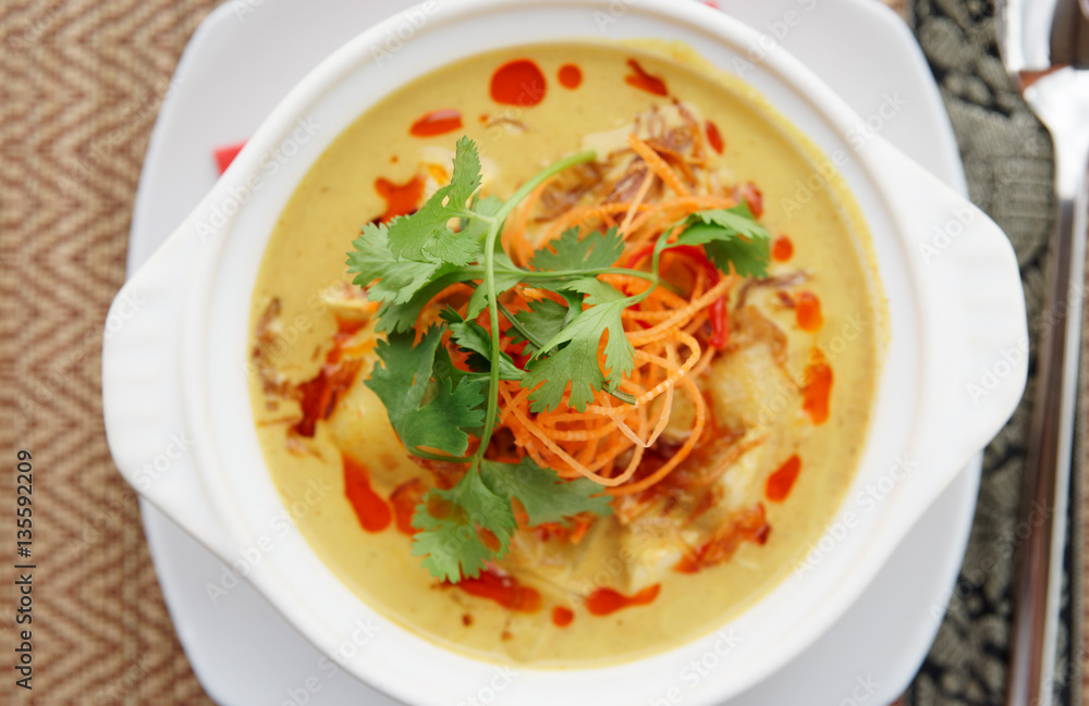 Bowl of Tom Yam, spicy curry dish Bowl of Tom Yam, spicy curry dish