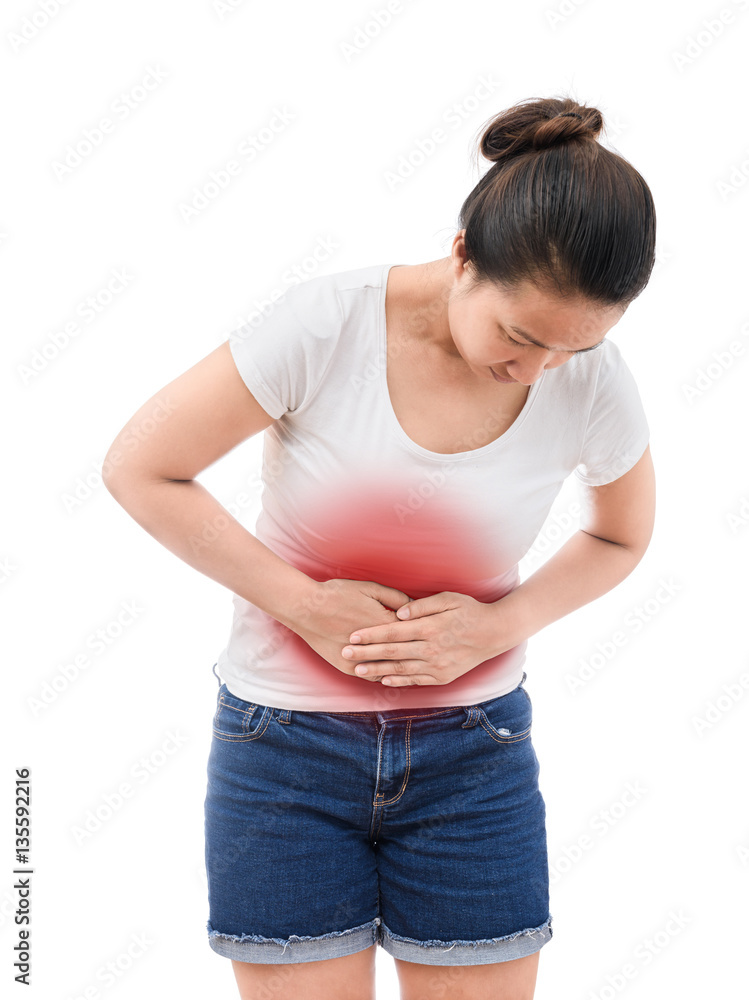 Young casual woman is having stomach ache.