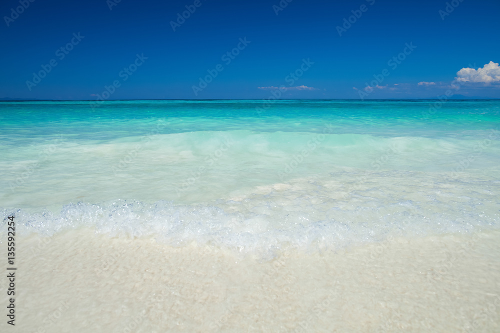 White sand beach at ocean in Tropicana with clear sky White sand beach at ocean in Tropicana with clear sky
