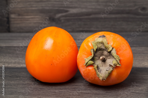 Persimmon. A delicious and healthy fruit. For your design.