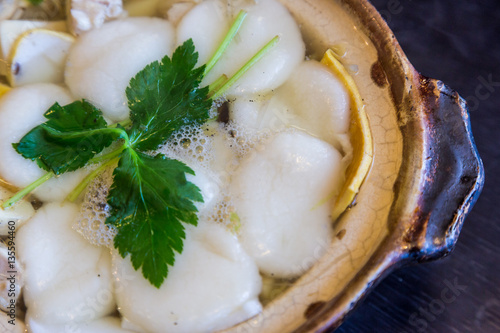 Traditional Shimabara Guzoni - soup with rice cake and seafood