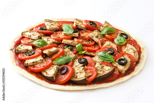 Vegetarian pizza with eggplant, tomato, black olives, oregano and basil isolated on white background
