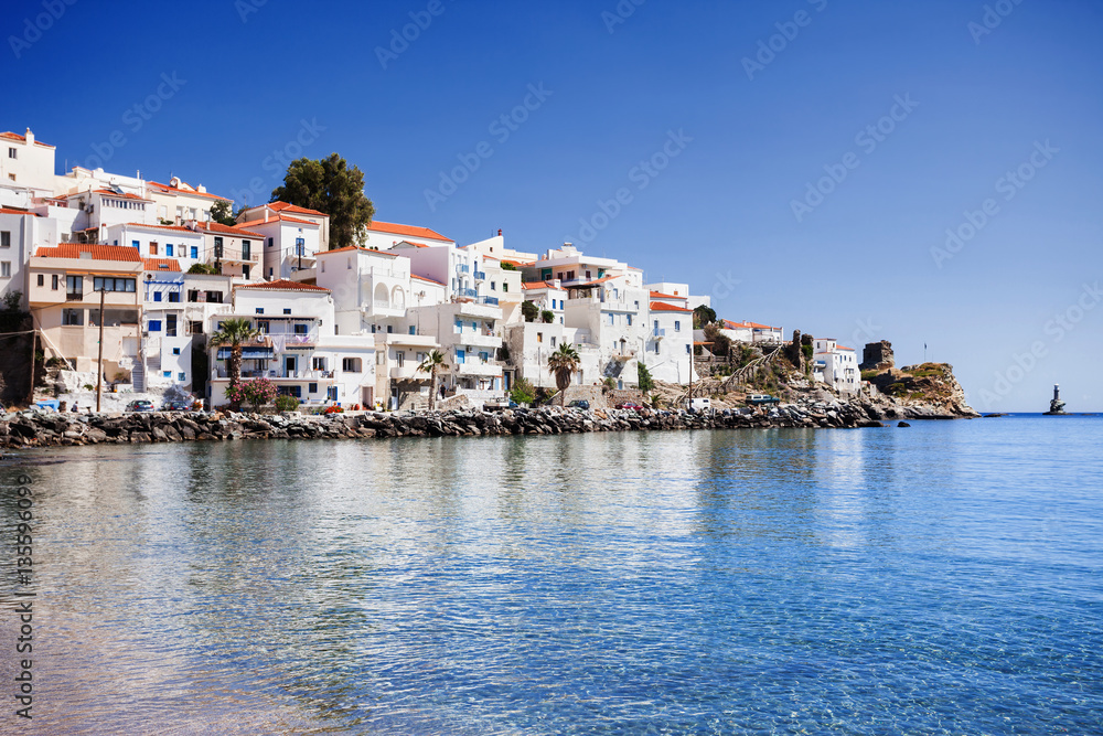 View of Andros town with beach, Andros island, Cyclades, Greece