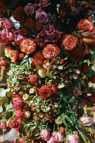 Lots of pinks and spearworts put in onde garland