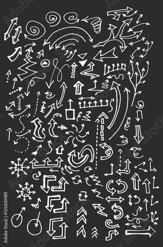 arrows doodle set on blackboard © veekicl