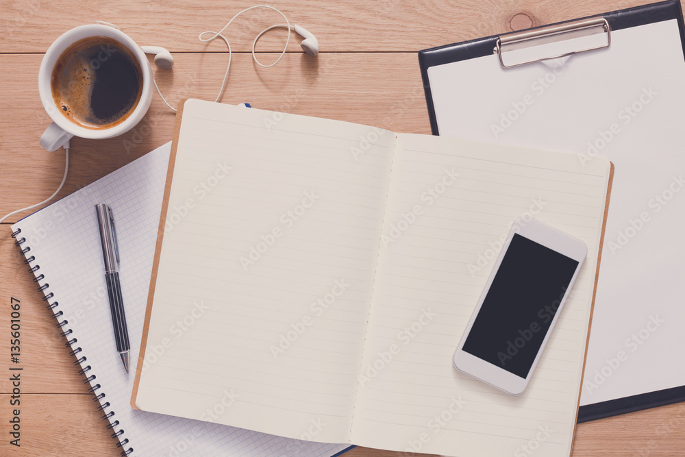 Notebook with mobile top view, study and office work Notebook with mobile top view, study and office work