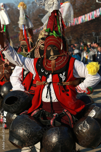 Pernik, Bulgaria - January 28, 2017: Masquerade festival Surva in Pernik, Bulgaria. People with mask called Kukeri dance and perform to scare the evil spirits