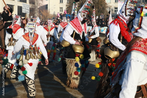 Pernik, Bulgaria - January 28, 2017: Masquerade festival Surva in Pernik, Bulgaria. People with mask called Kukeri dance and perform to scare the evil spirits.