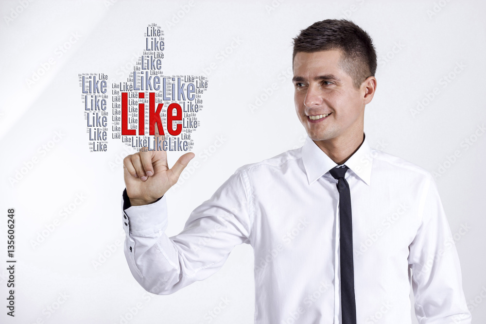 Like Hand - Young businessman touching word cloud Like Hand - Young businessman touching word cloud