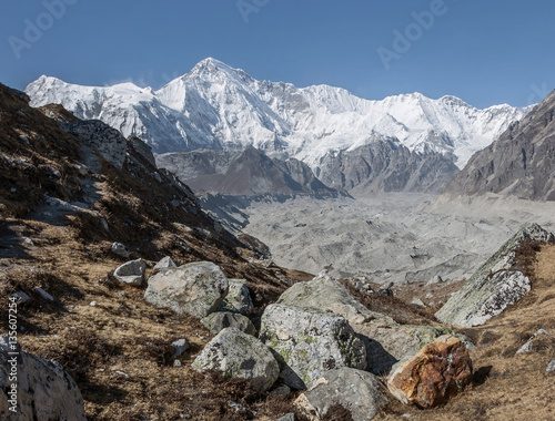 View of the upper reaches of the glacier Gokyo with peaks Cho Oyu (8201 m) - Gokyo region, Nepal photo