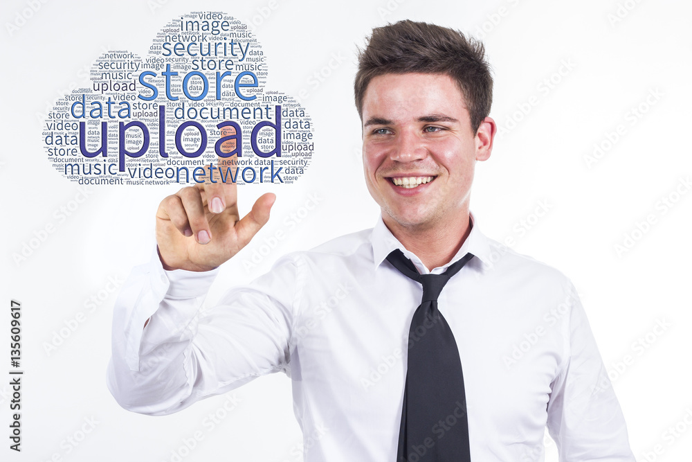 Upload to cloud - Young businessman touching word cloud Upload to cloud - Young businessman touching word cloud