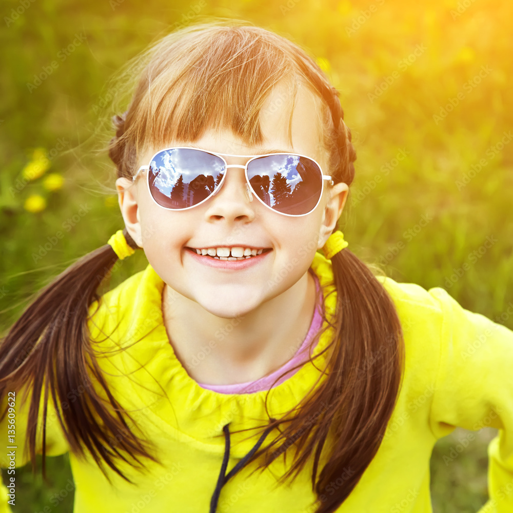 happy little girl in the park happy little girl in the park