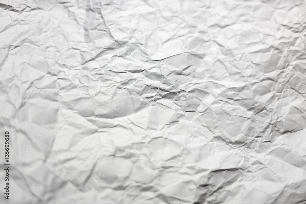 Fototapeta premium Crumpled white page of paper texture