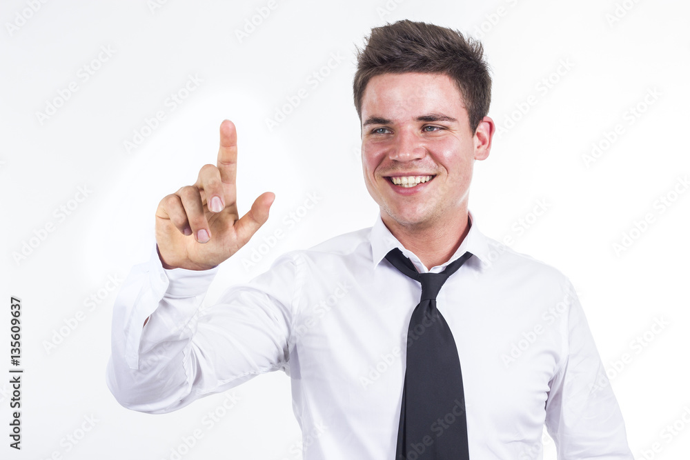 Young businessman touching transparent surface Young businessman touching transparent surface