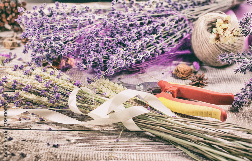 Fototapeta premium Workplace of the florist. Vintage end retro toning. Top view