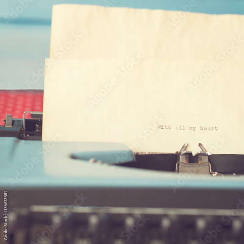 Vintage turquoise typewriter with valentines day message