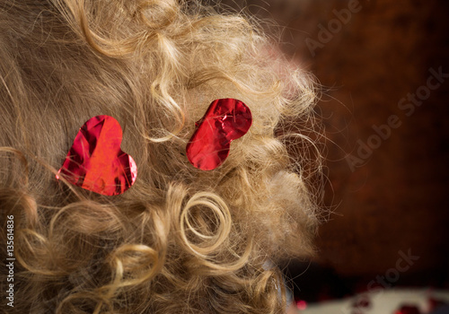 Little heart on the hair is a little curly girl