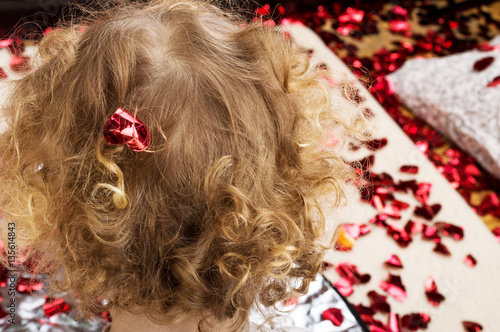Little heart on the hair is a little curly girl
